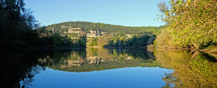 River Dordogne looking down river towards Roque Gageac, evening light, reflections